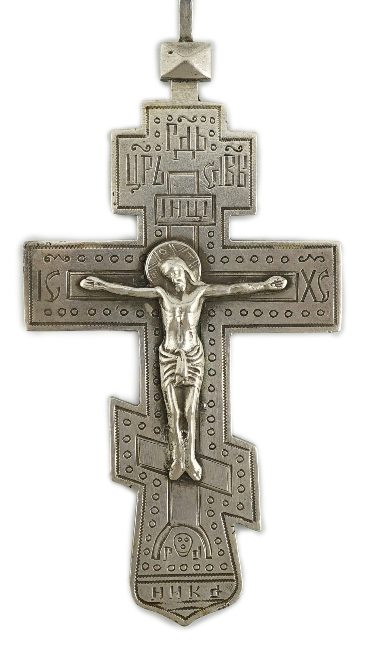 A late 19th century Russian 84 zolotnik silver crucifix, assay master Lev Oleks, Moscow, 1896, engraved with Cyrillic script